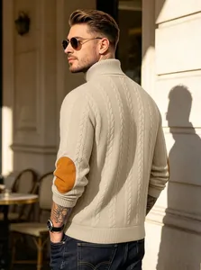 Men's stylish cable-knit turtleneck sweater featuring brown elbow patches in beige