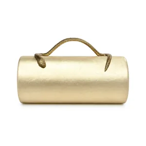 Detailed view of luxury gold PU leather cylindrical clutch bag with snake shaped handle