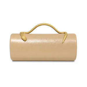 Detailed shot showing a beige cylindrical PU evening bag with a golden snake handle