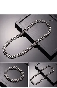 Détails de l'ensemble collier et bracelet cubains argentés hip-hop avec épines