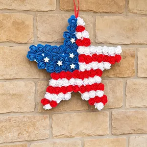 Independence Day star wreath with red, white and blue roses for wall decoration.