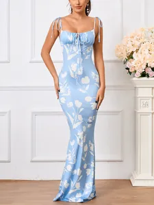 Floral light blue mermaid maxi dress featuring tie-up straps and elegant cut-out bust detail.