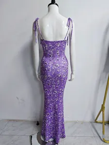 Back view of a purple floral camisole mermaid dress featuring tie-up shoulder straps