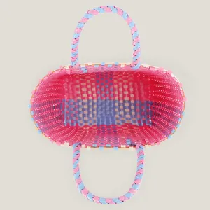 Colorful hand-woven plastic picnic tote bag with sweet contrast pink and blue design