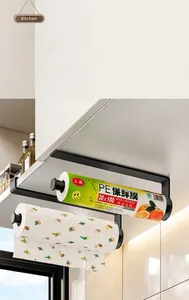 Under cabinet paper towel and cling film holder detail in modern kitchen
