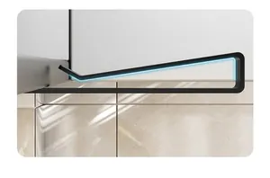 Detailed view of the black metal paper towel holder featuring a 45-degree angle design