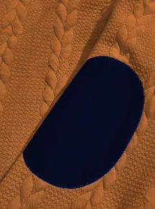 Detailed view of men's jacquard henley pullover fabric with dark navy elbow patch