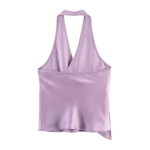 Close-up of lilac satin halter top showing silky texture and elegant draping