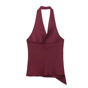 Back view of wine red satin halter neck top featuring an asymmetrical draped hem