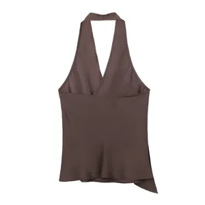 Macro view of a brown satin halter neck top showing the smooth and silky fabric texture