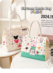 Two cute insulated lunch bags with cartoon animal patterns and vibrant polka dots