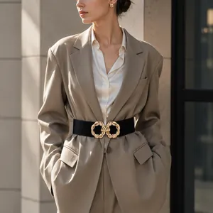 Elegant black elastic wide belt for women featuring a stylish interlocking gold buckle