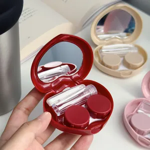 Portable heart-shaped contact lens case with built-in mirror and full accessory kit