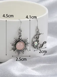 Vintage silver-tone sun and moon dangle earrings with size dimensions shown