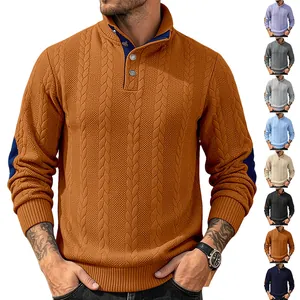 Close-up of men's cable knit sweater with button stand collar and elbow patches.
