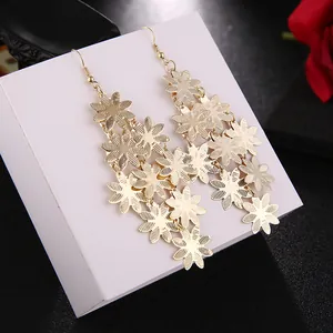 Elegant gold multi-layer daisy flower tassel dangle earrings for fashion-forward women