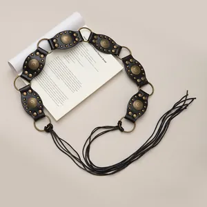 Bohemian vintage waist chain with bronze studs and long braided black tassels