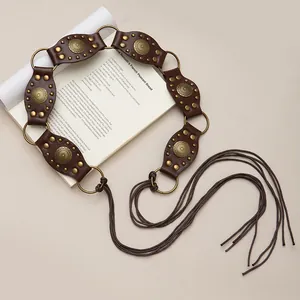 Vintage Bohemian brown waist chain with tassel ties and bronze floral metal details.