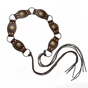 Vintage bohemian leather waist belt with bronze rings and long tassels on white