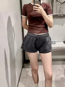 Slim fit round neck short sleeve T-shirt featuring white contrast trim details in maroon
