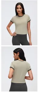 Front and back detail of khaki sports t-shirt with contrast trim for yoga training