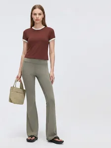 Women's contrast trim athletic t-shirt and flared yoga pants set in brown and green