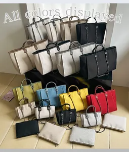 Collection of chain tote bags in multiple colors and sizes from large to mini pouches