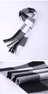 Detailed close-up view of a British style black and white checkered scarf with tassels