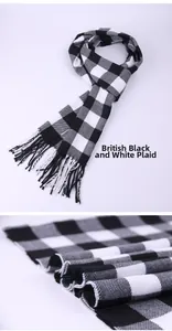 Close-up detail of the black and white plaid texture on this winter men's fringe scarf