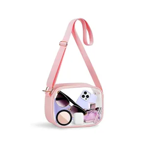 Detailed view showing the spacious interior of the pink transparent crossbody bag