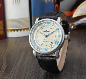 Close-up view of Winner automatic mechanical watch featuring blue Roman numerals