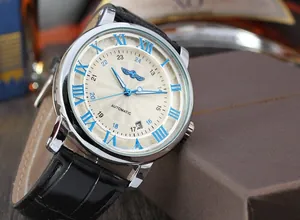 Close-up of Winner men's automatic mechanical watch with blue Roman numerals and black leather strap