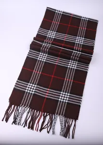 Close-up of a brown classic British style plaid scarf for men featuring elegant tassels
