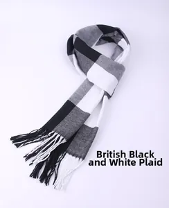 Classic black and white buffalo check pattern on soft winter scarf with tassels