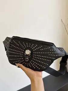 Trendy punk skull waist bag with silver rivets and gemstone embellishment