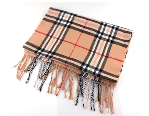 Classic British style plaid scarf featuring elegant tassels in camel for winter warmth and style