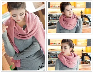 Elegant soft pink knitted snood scarf for women, textured winter neck warmer detail view