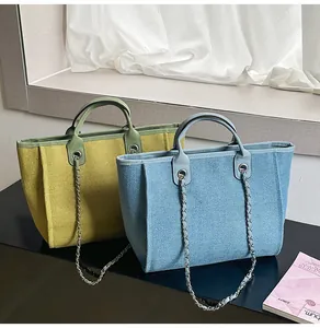Fashionable large capacity woven tote bags with chain straps in blue and green