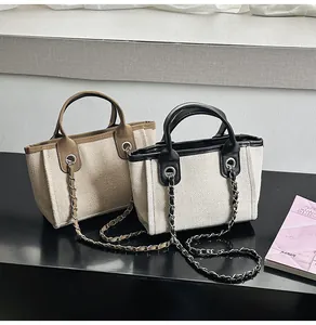 Detail of 2024 large capacity canvas tote bags with elegant chain straps in two colors