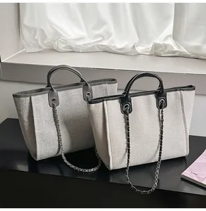 Elegant large capacity woven tote bags with leather handles and metal chain straps