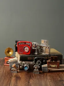 Retro resin miniatures collection including camera, radio, and gramophone ornaments