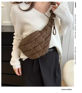 Stylish brown quilted chest bag shown on model in a modern indoor setting
