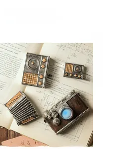 Detailed close-up of retro resin miniatures camera and radio on a vintage book