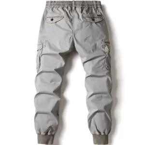Back view of men's grey cargo joggers featuring elastic waist and multiple pockets.