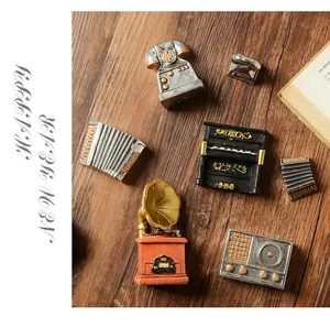 Vintage miniature resin ornaments including gramophone and radio for home decor