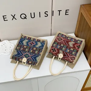 Ethnic style woven tote bags featuring traditional geometric patterns and rope handles