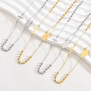 Detailed view of 3mm stainless steel rosary necklaces with Virgin Mary and cross.