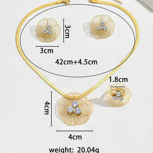 Detailed view of gold floral jewelry set with zircons and dimension markings