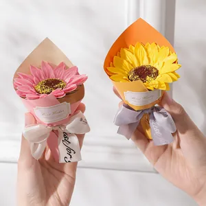 Miniature sunflower and pink soap flower bouquets with Best Wishes ribbons for gift box