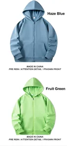 Solid color zip-up hooded sweatshirt for men and women in misty blue and fruit green